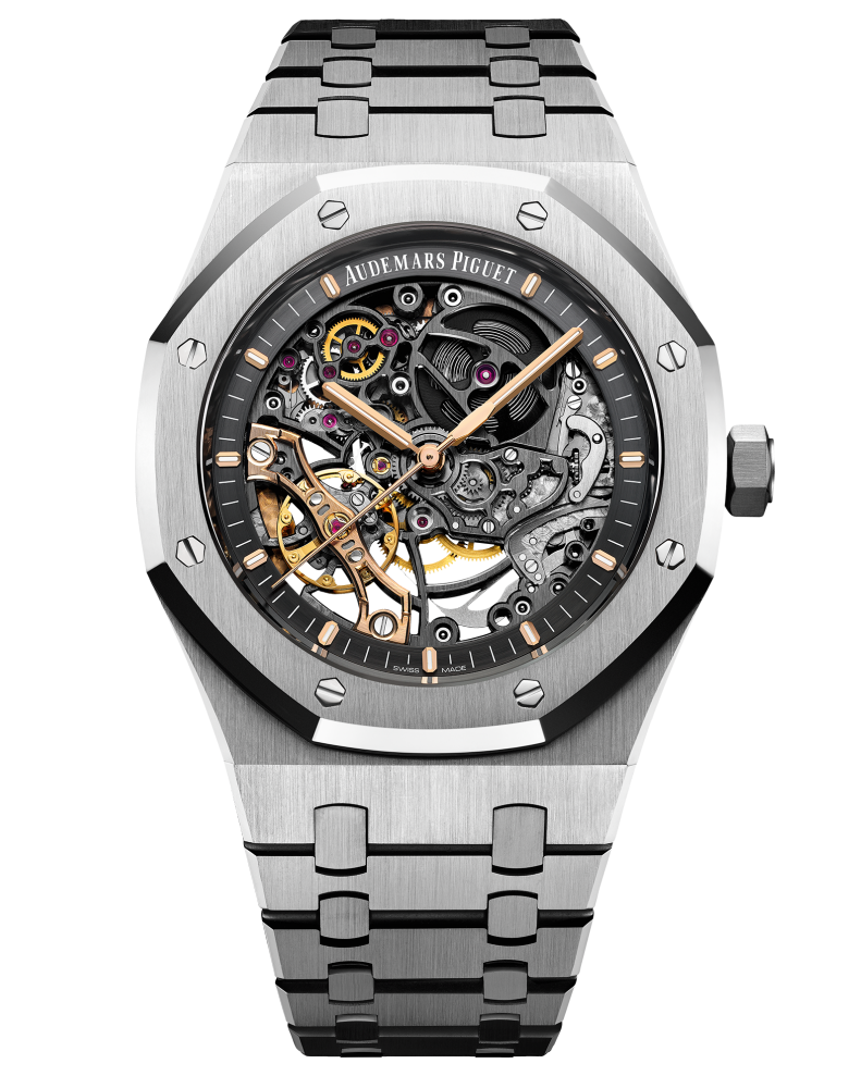 A steel watch with a see through face revealing the inner mechanisms of the watch