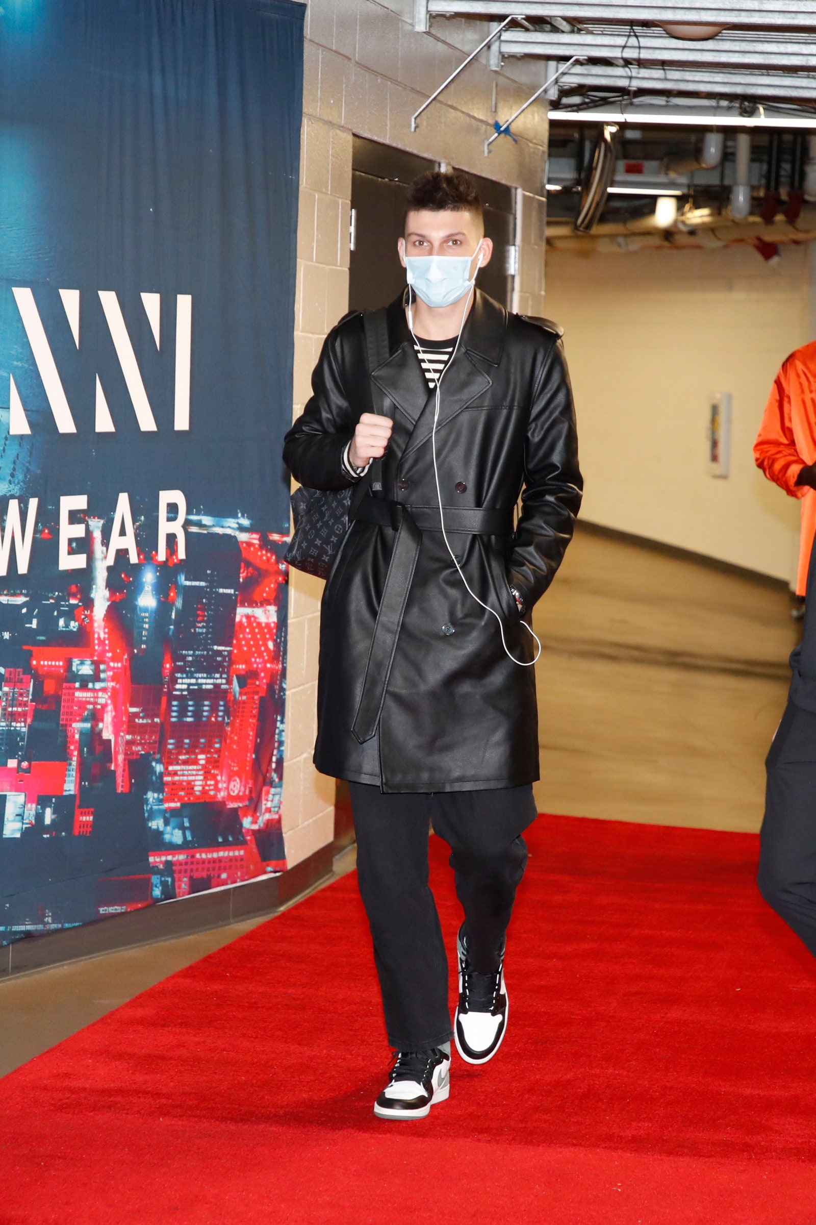 Image may contain Human Person Clothing Apparel Fashion Coat Shoe Footwear Premiere and Red Carpet