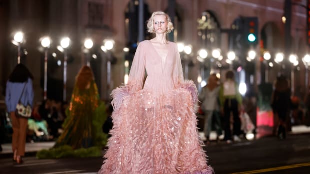  A model walks the runway during Gucci Love Parade