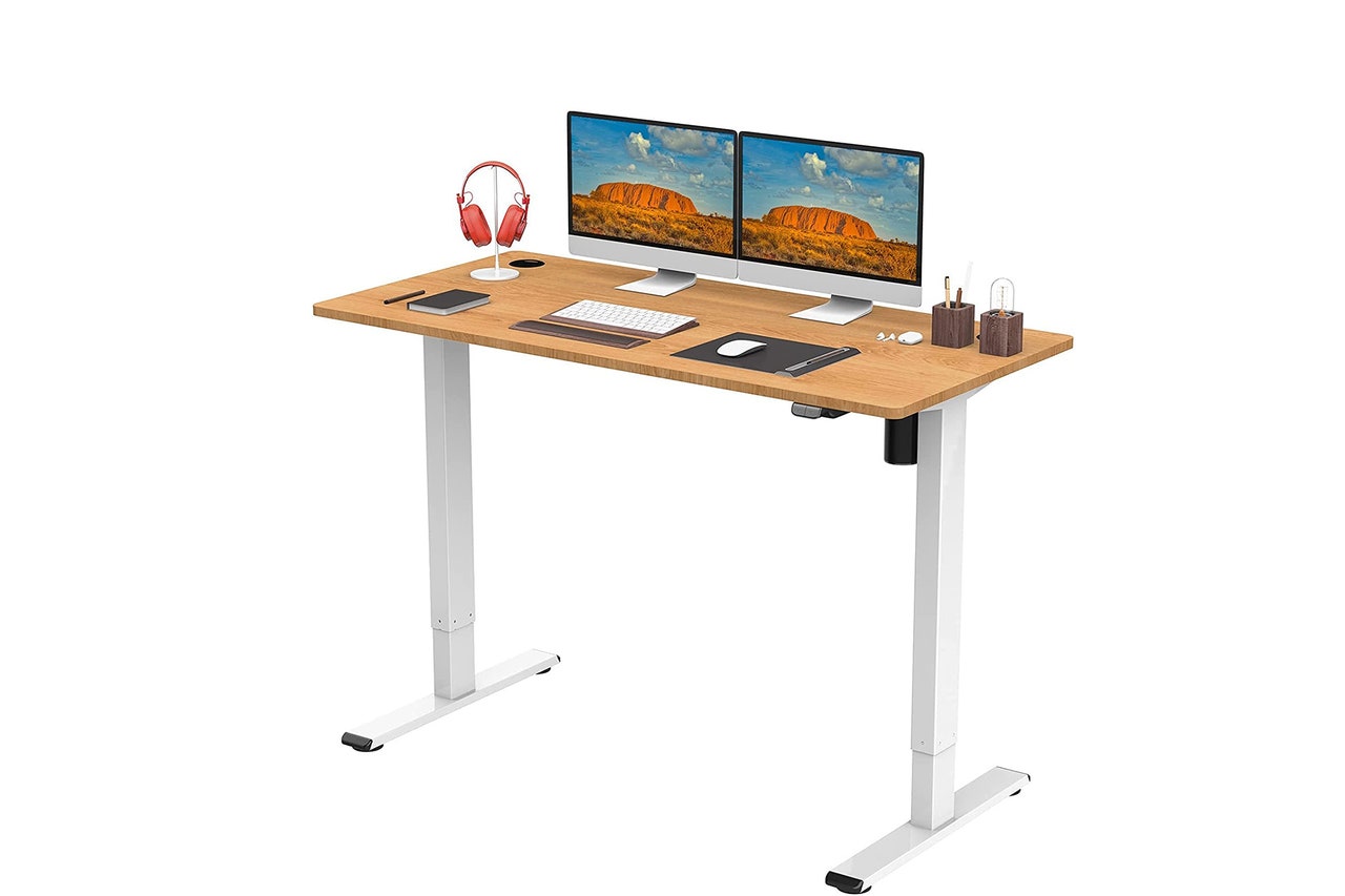 Image may contain: Furniture, Table, Desk, Electronics, and Computer