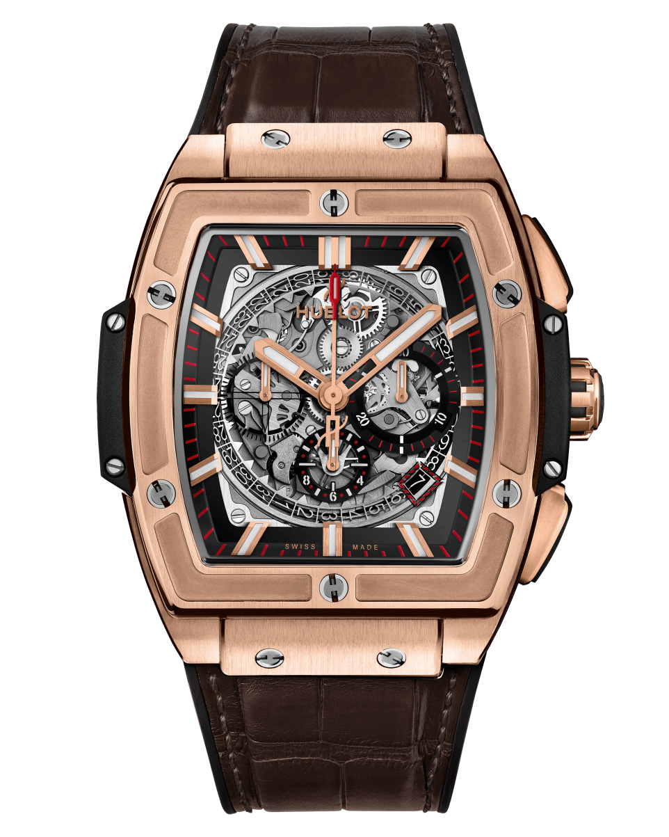 A rose gold watch with a transparent face revealing the inner mechanisms of the watch