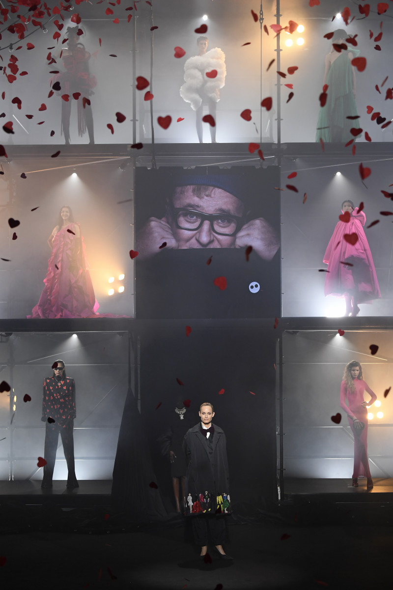 Amber Valletta poses on the runway with models during the runway during the "Love Brings Love" show 