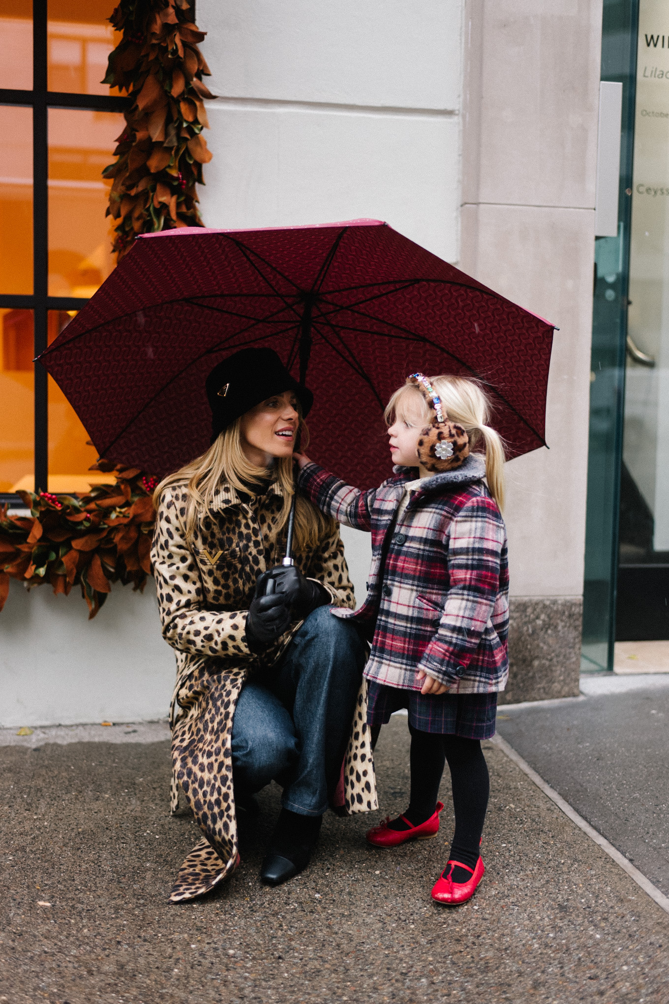 cheetah print wool coat black velvet bucket hat nyc at christmas